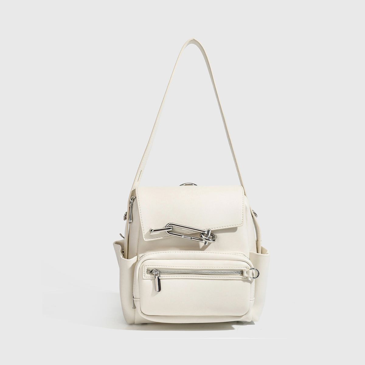 Small structured black leather-look backpack handbag with flap closure, silver-tone metal clasp, front zip pocket, and ring