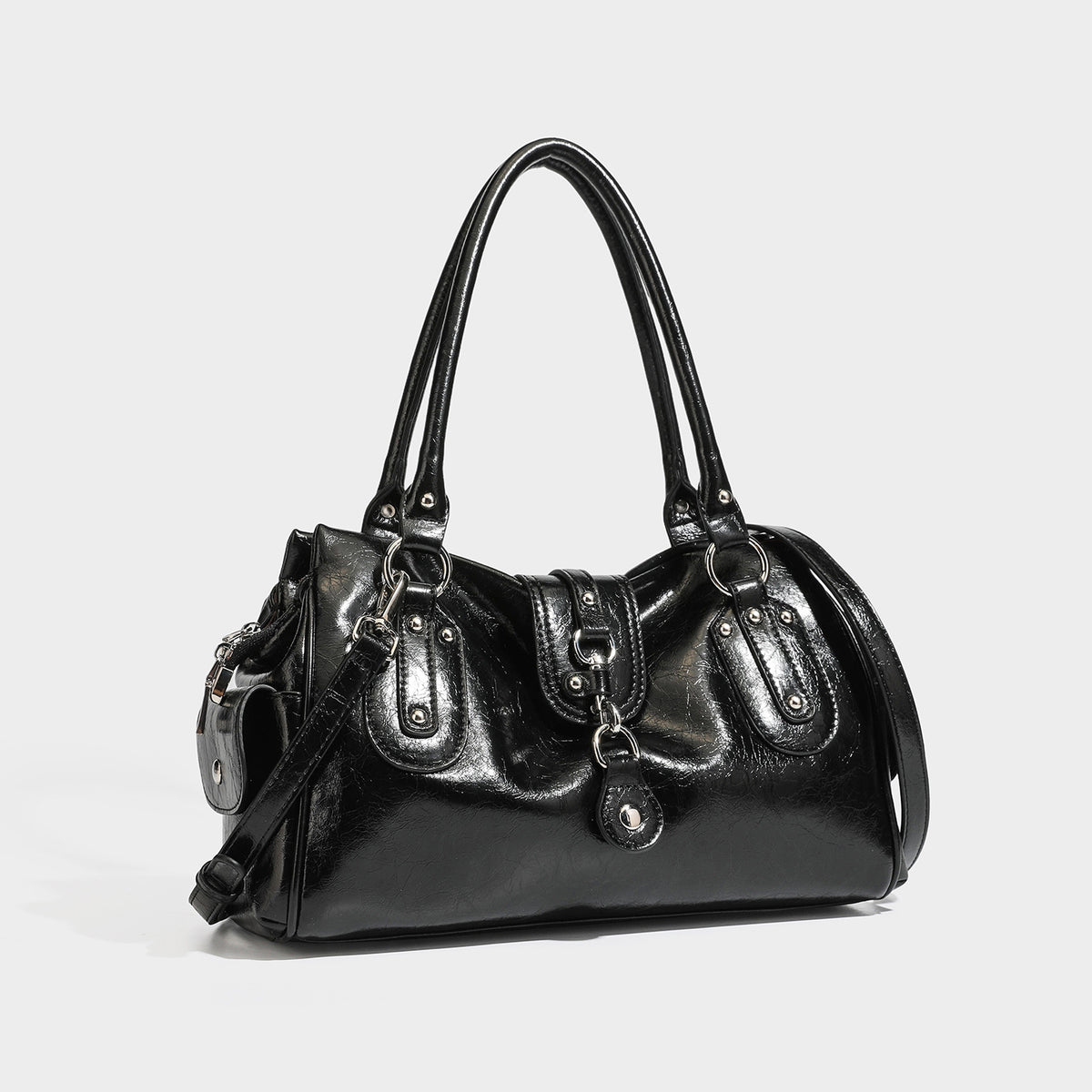 Glossy crinkled barrel satchel bag with double top handles, front flap-strap panel, ring and stud hardware, and detachable