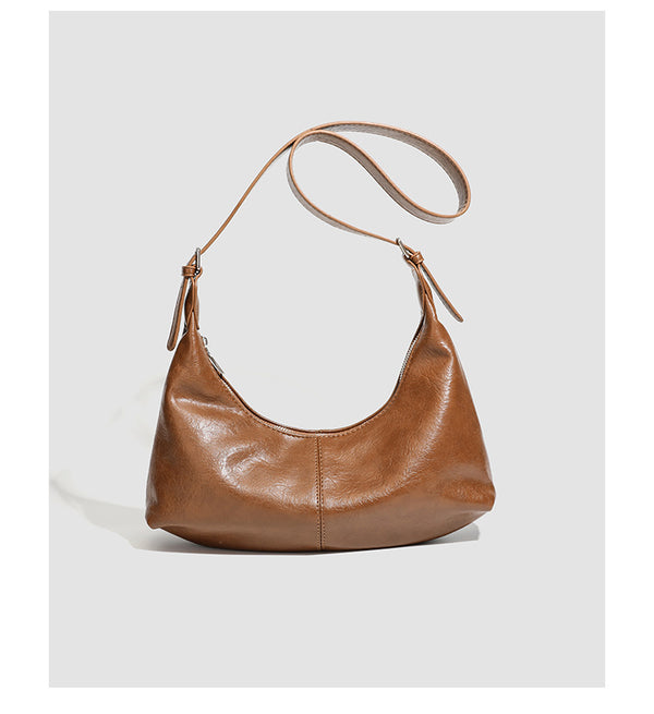 Slouchy crescent hobo shoulder bag with zip-top closure and adjustable strap, detail view 14