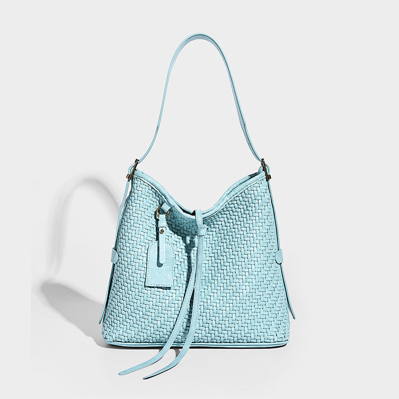 Slouchy woven-texture bucket shoulder bag with tassel tie closure and gold-tone hardware, detail view 12