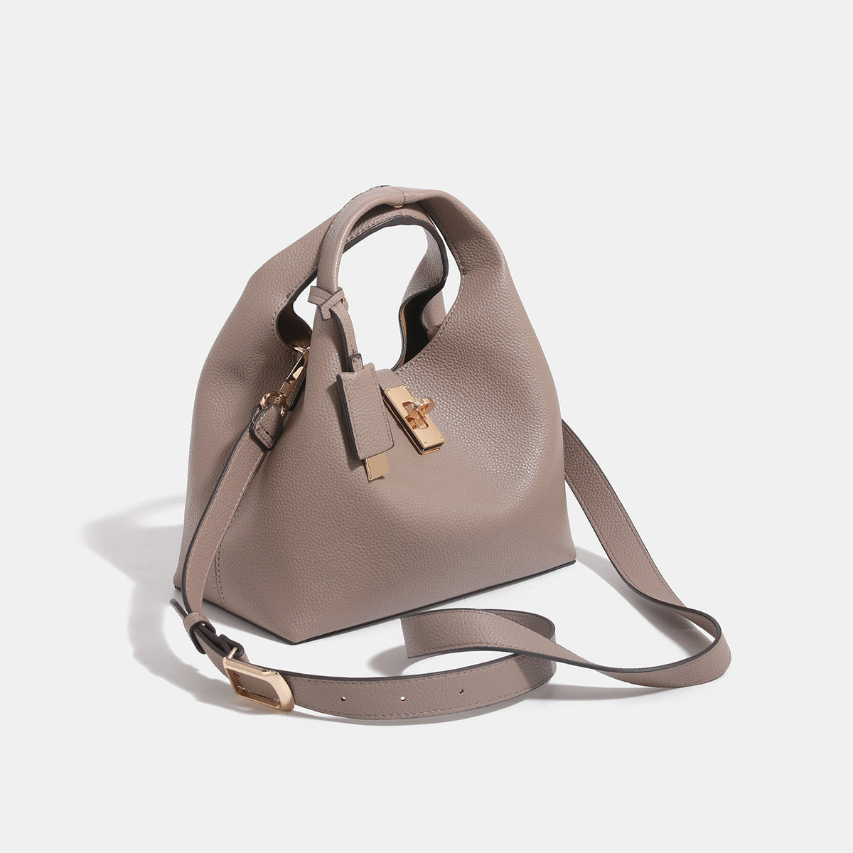 Structured pebbled leather-look bucket tote with gold-tone turn-lock hardware and looped top handle, detail view 3