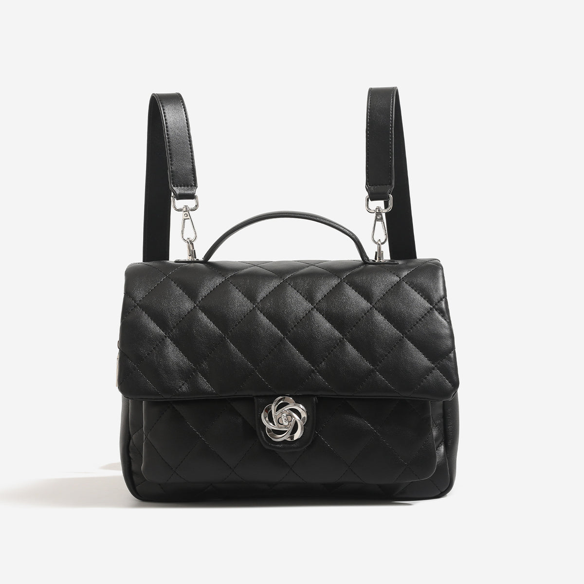 Diamond-quilted flap backpack handbag with silver-tone flower turn-lock, top handle, and dual shoulder straps, detail view 9