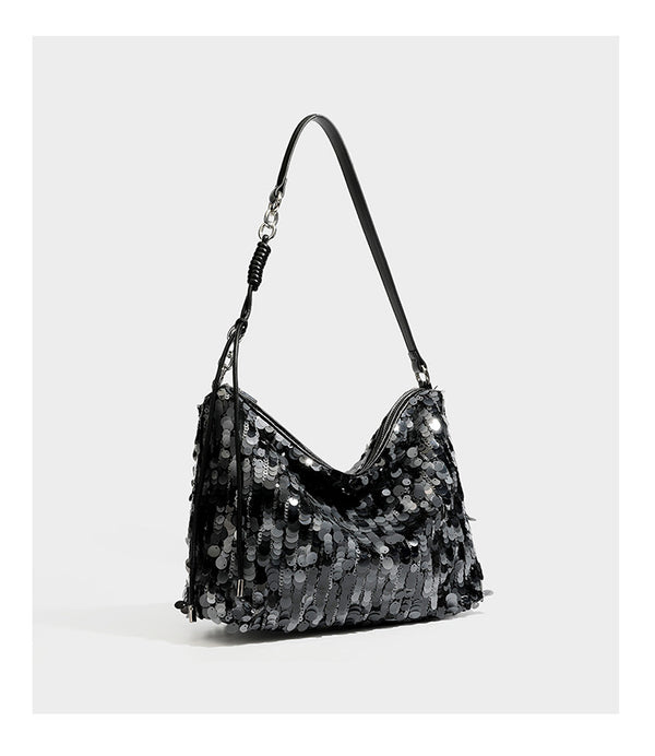 Slouchy paillette sequin hobo shoulder bag with zip closure and adjustable leather-look strap with silver chain hardware