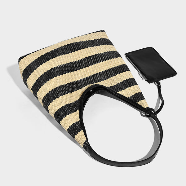 Black and beige striped woven shoulder tote bag with leather-look trim and detachable black zip pouch, detail view 4
