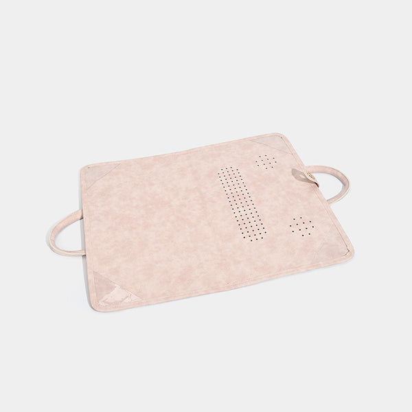 Blush pink structured flat tote bag with matte textured finish, dual top handles, and gold-tone twist clasp, detail view 4