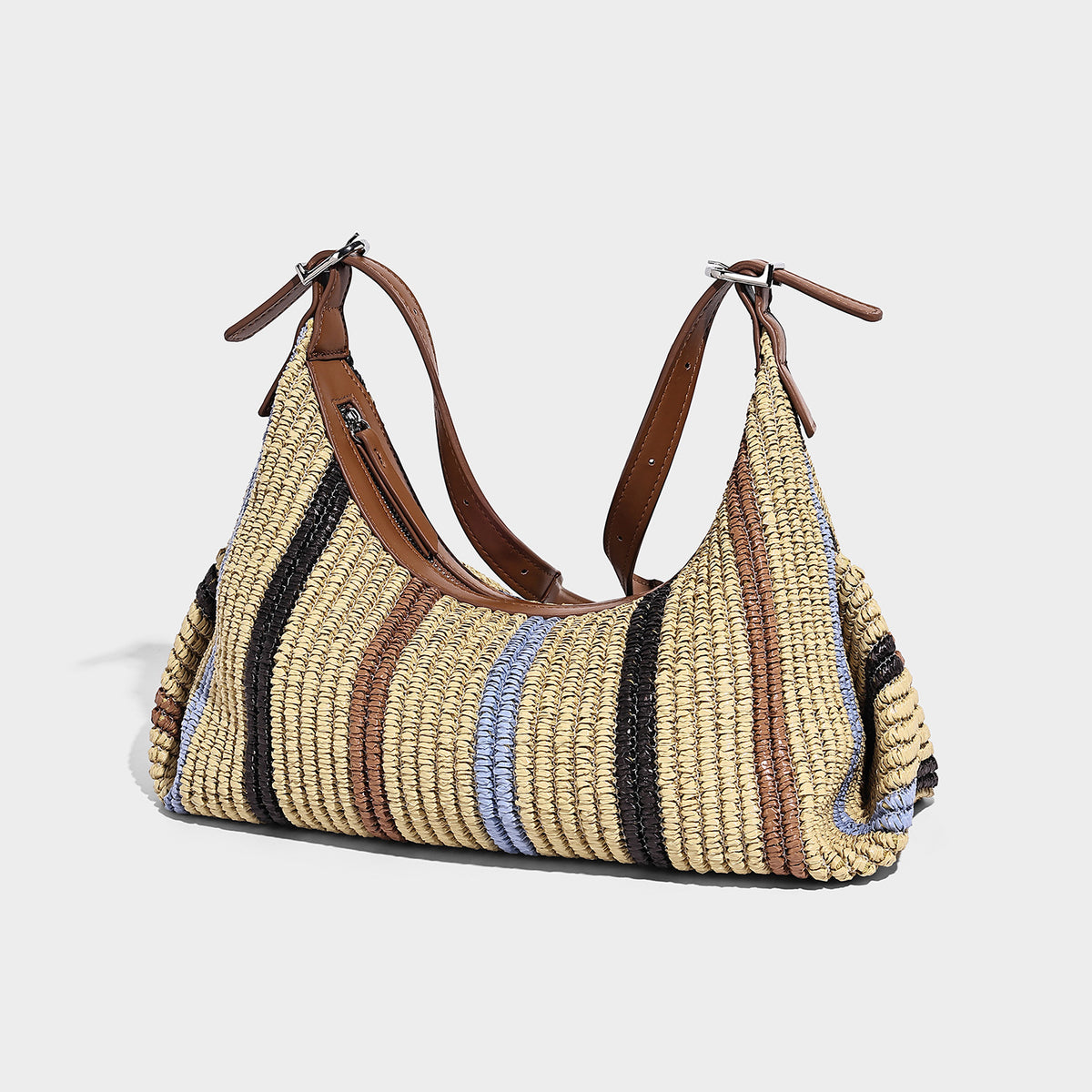 Slouchy woven straw hobo shoulder bag with beige, black, brown, and blue vertical stripes and brown leather-look trim, detail