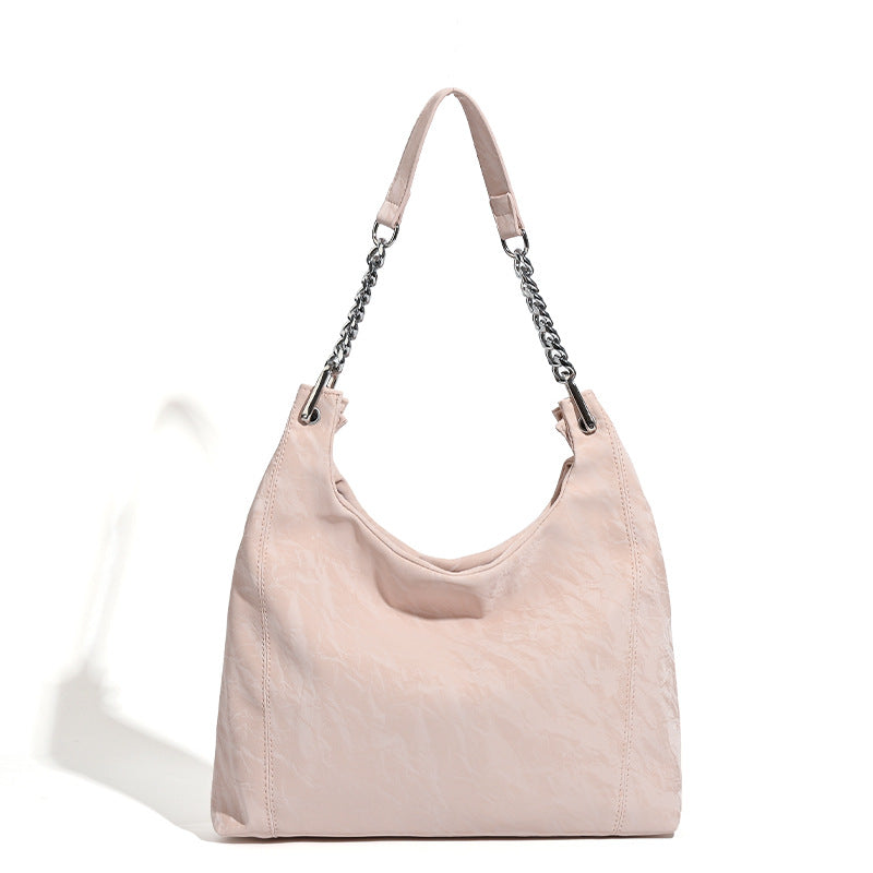 Large embossed leather-look shoulder tote bag with silver-tone chain strap, detail view 5