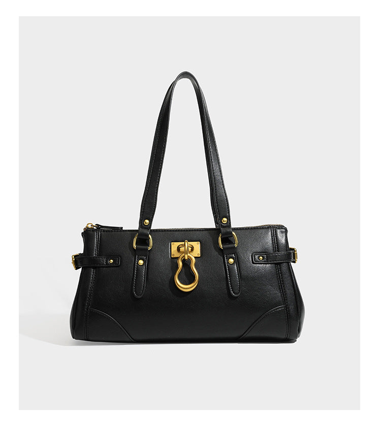 Strukturierte dunkelbraune Satchel-Tote in Lederoptik mit Ringverschluss in Antikgold-Optik, zwei Henkeln und seitlichem Riemen mit Schnalle