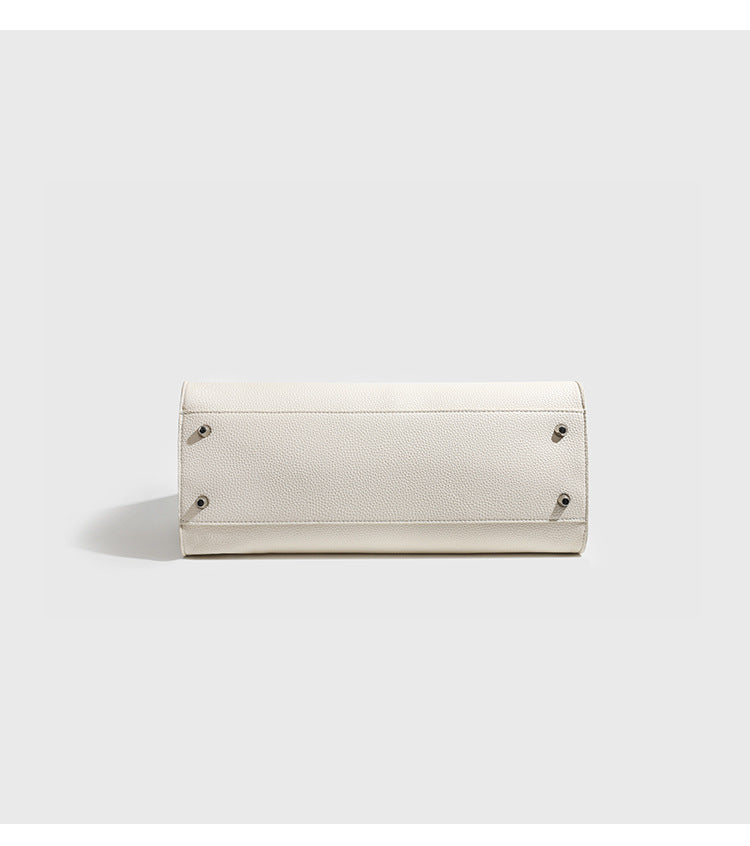 Large structured pebbled leather-look tote bag with double top handles and silver-tone hardware, detail view 12
