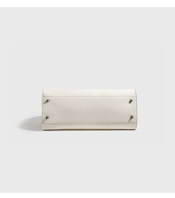 Large structured pebbled leather-look tote bag with double top handles and silver-tone hardware, detail view 12