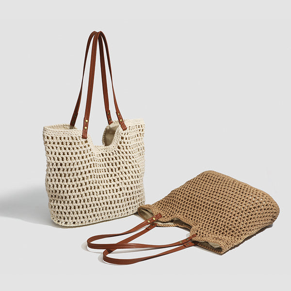Open-knit woven tote bag with leather-look shoulder straps and brass-tone hardware in off-white, detail view 2
