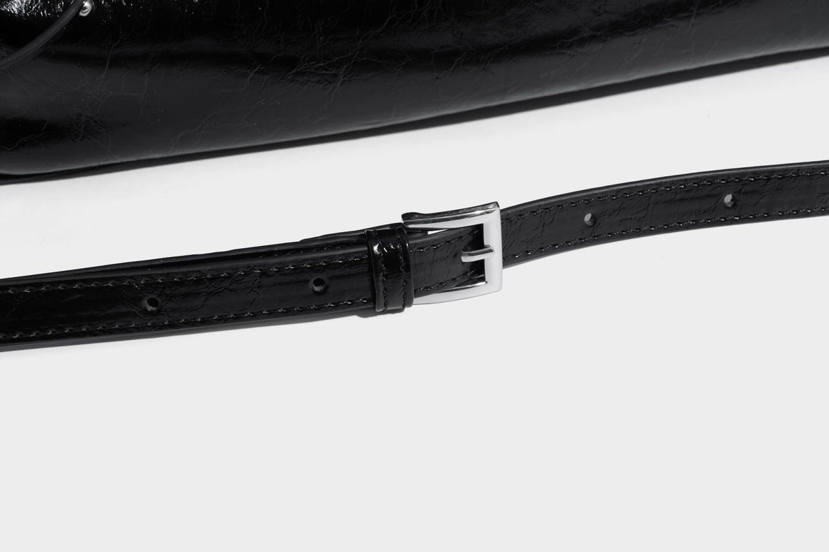 Glossy crinkled leather-look tote bag with silver grommet lace-up front detail, dual top handles, and detachable shoulder