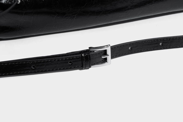 Glossy crinkled leather-look tote bag with silver grommet lace-up front detail, dual top handles, and detachable shoulder