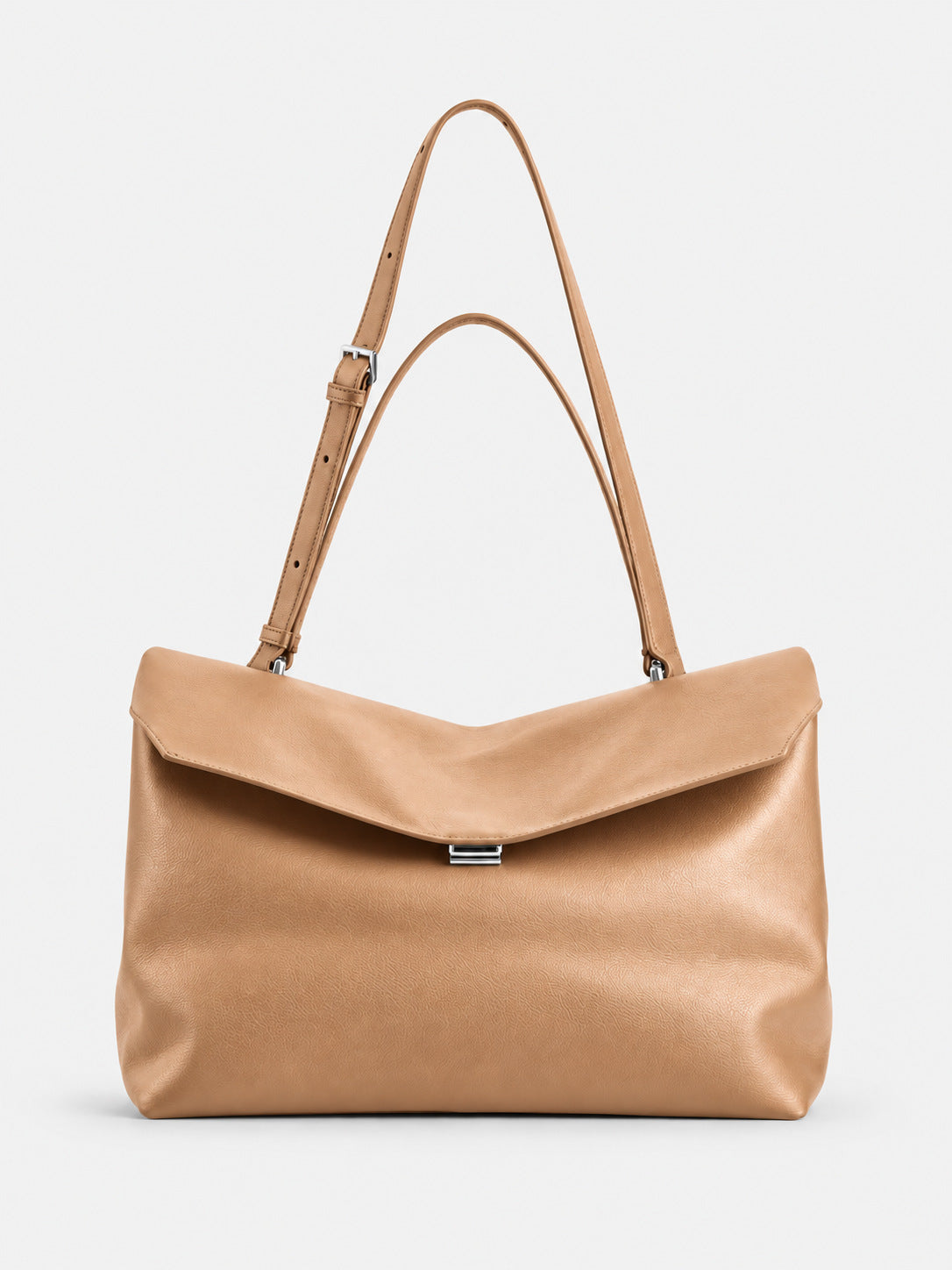 Large black slouchy leather-look shoulder bag with V-shaped envelope flap, silver-tone clasp, and adjustable strap, detail