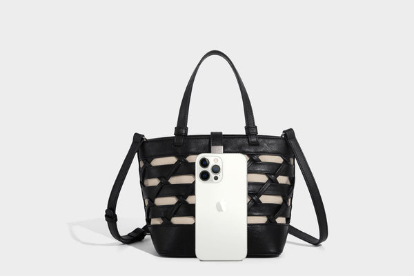 Structured woven lattice tote bag with cream lining, dual top handles, detachable crossbody strap, and silver-tone hardware