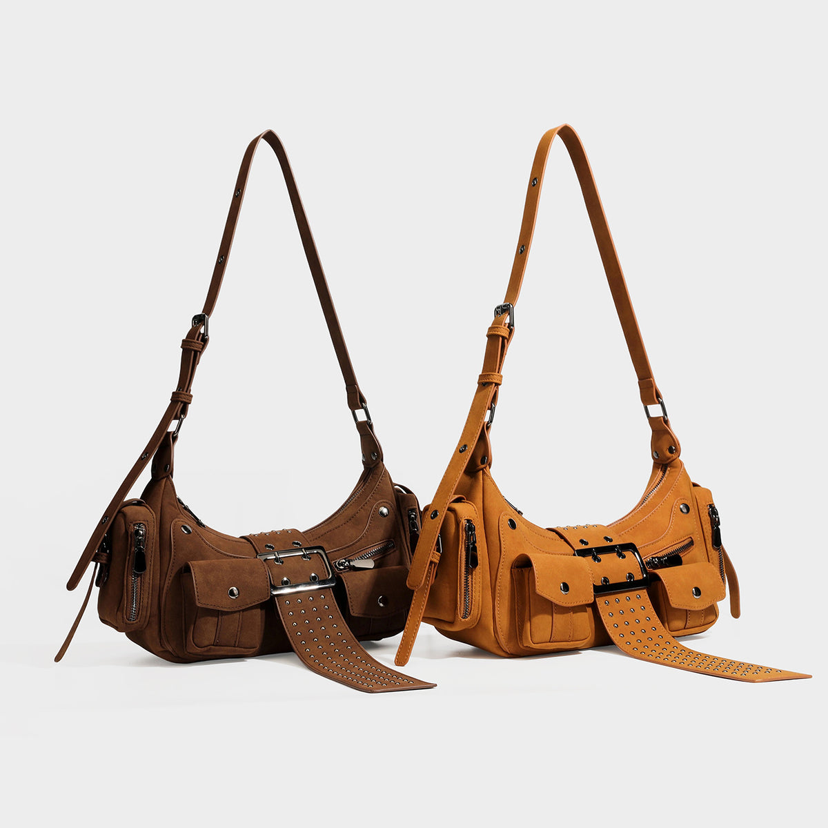 Braune Schultertasche in matter Velourslederoptik mit Gunmetal-Nieten, vorderer Schnallenlasche, aufgesetzten Klappentaschen und verstellbarem Crossbody-Riemen