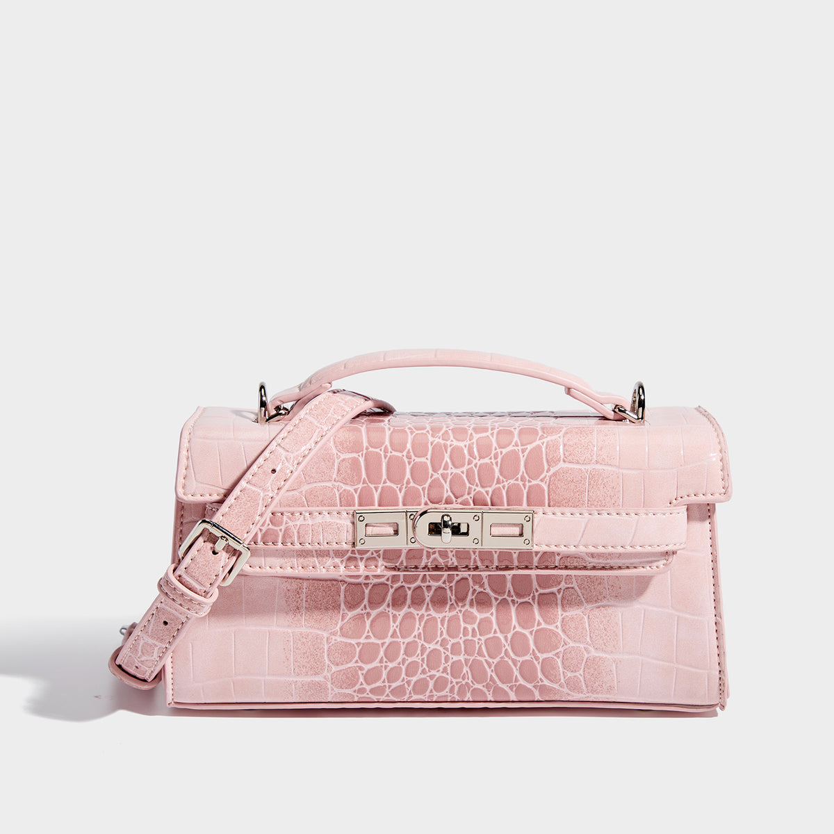 Compact structured flap satchel with glossy crocodile-embossed leather-look finish, silver-tone turn-lock hardware, and