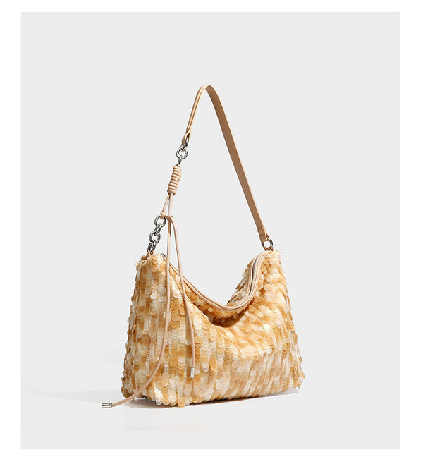 Slouchy paillette sequin hobo shoulder bag with zip closure and adjustable leather-look strap with silver chain hardware