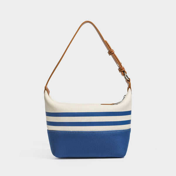 Schultertasche aus cremefarbenem und blau gestreiftem Canvas mit Riemen in hellbrauner Lederoptik und Reißverschluss in Silberoptik, Detailansicht 6