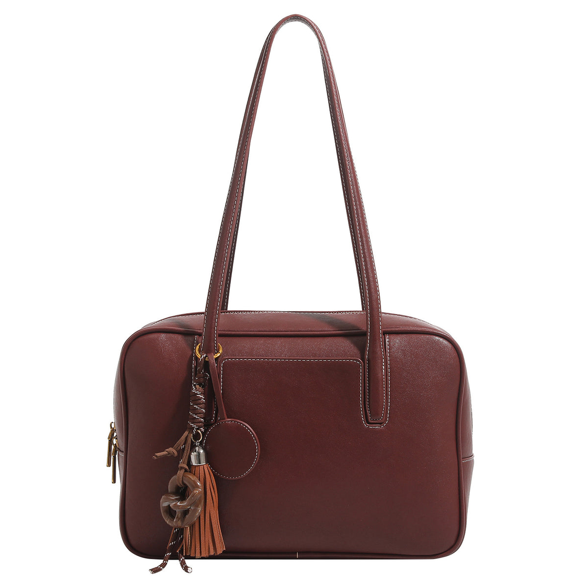 Structured rectangular leather-look shoulder bag with top zip, tassel and resin ring charm, and contrast topstitching, detail