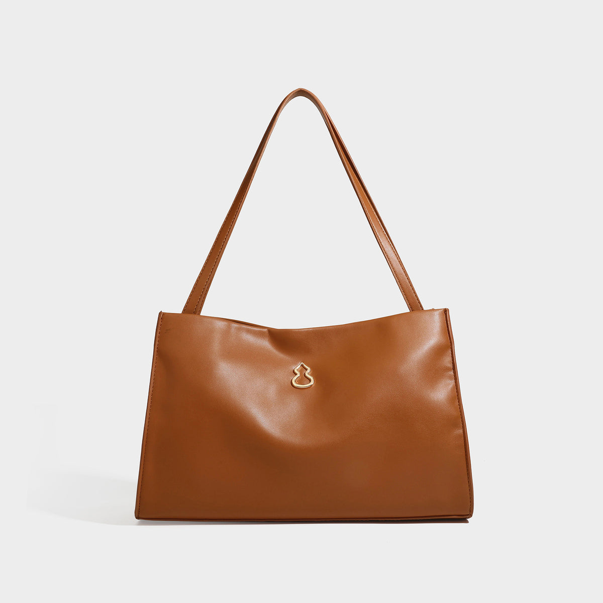 Structured rectangular shoulder tote bag with smooth leather-look finish, long double straps, and gold-tone gourd emblem on