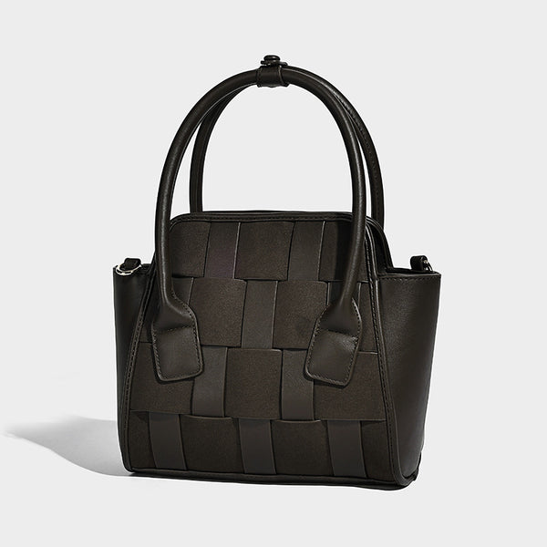 Small structured woven-panel mini tote bag with double top handles and detachable crossbody strap in matte leather-look
