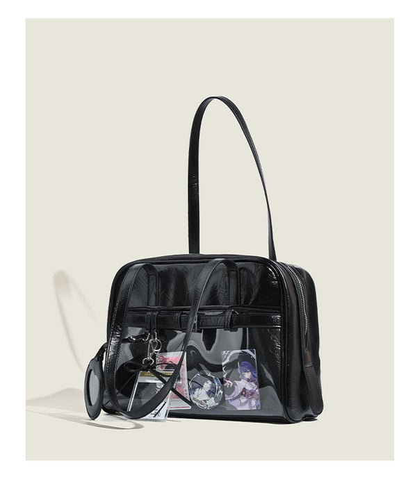 Strukturierte Schultertasche im Boston-Stil mit abgerundet-rechteckigem Korpus, zwei Tragegriffen oben und Reißverschlussfach vorne, Detailansicht 19