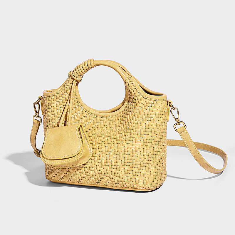Woven texture tote bag with knotted top handles, attached front mini pouch, and gold-tone hardware, detail view 4