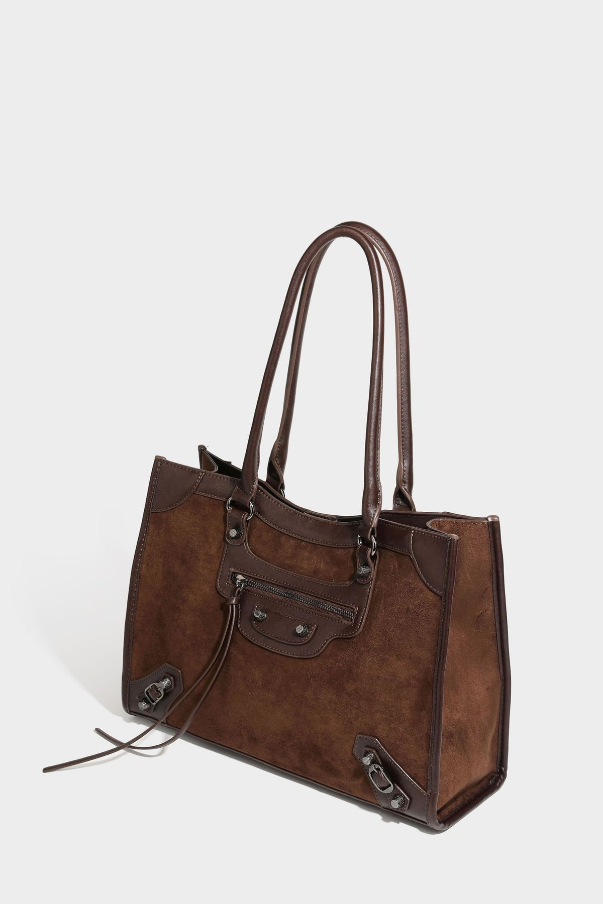 Large structured tote bag with matte suede-like body, smooth leather-look trim, front zip pocket, stud hardware, and