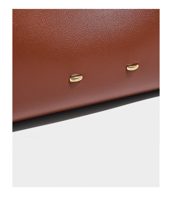 Large open-top hobo shoulder bag in tan leather-look finish with detachable zip pouch and adjustable buckle strap, detail