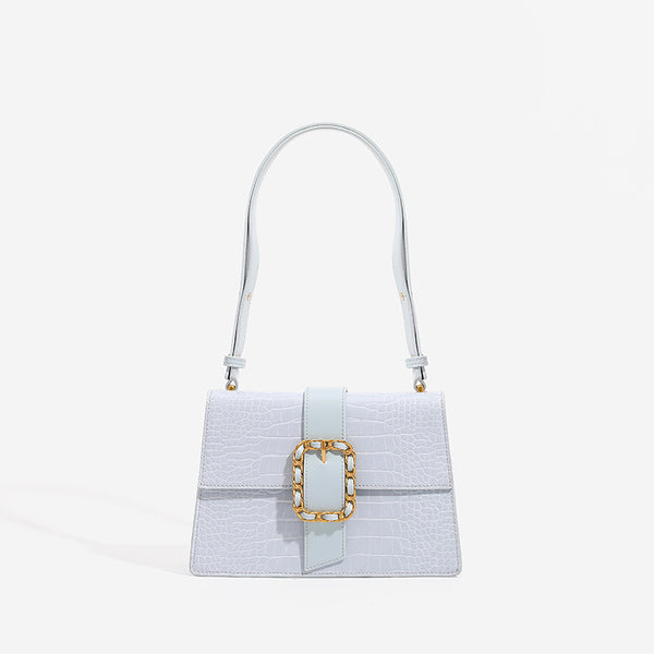Structured crocodile-embossed flap shoulder bag with gold chain buckle hardware and adjustable strap, front view