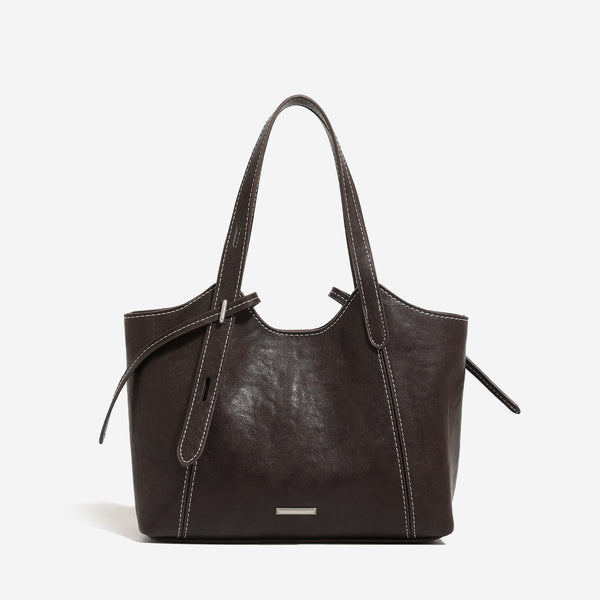 Strukturierte Tote-Bag aus Used-Lederimitat mit kontrastierenden Ziernähten, seitlichem Bindebanddetail, zwei Tragegriffen oben und abnehmbarem
