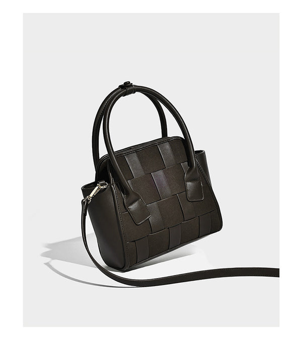 Small structured woven-panel mini tote bag with double top handles and detachable crossbody strap in matte leather-look