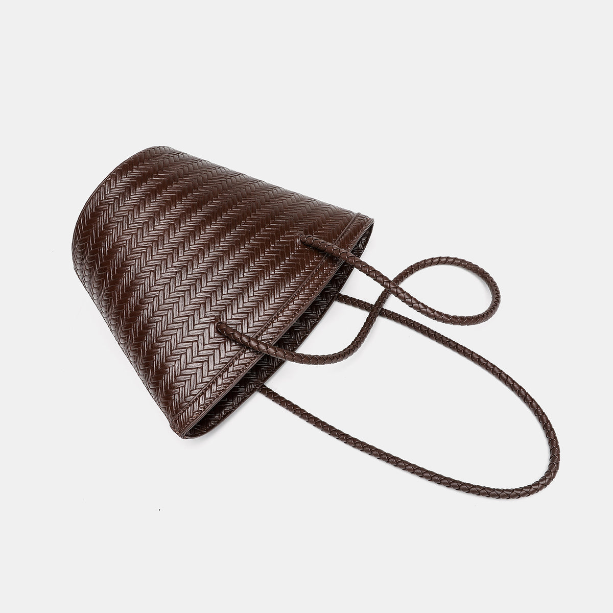 Woven herringbone-texture bucket bag with braided rope shoulder strap in dark brown, detail view 4