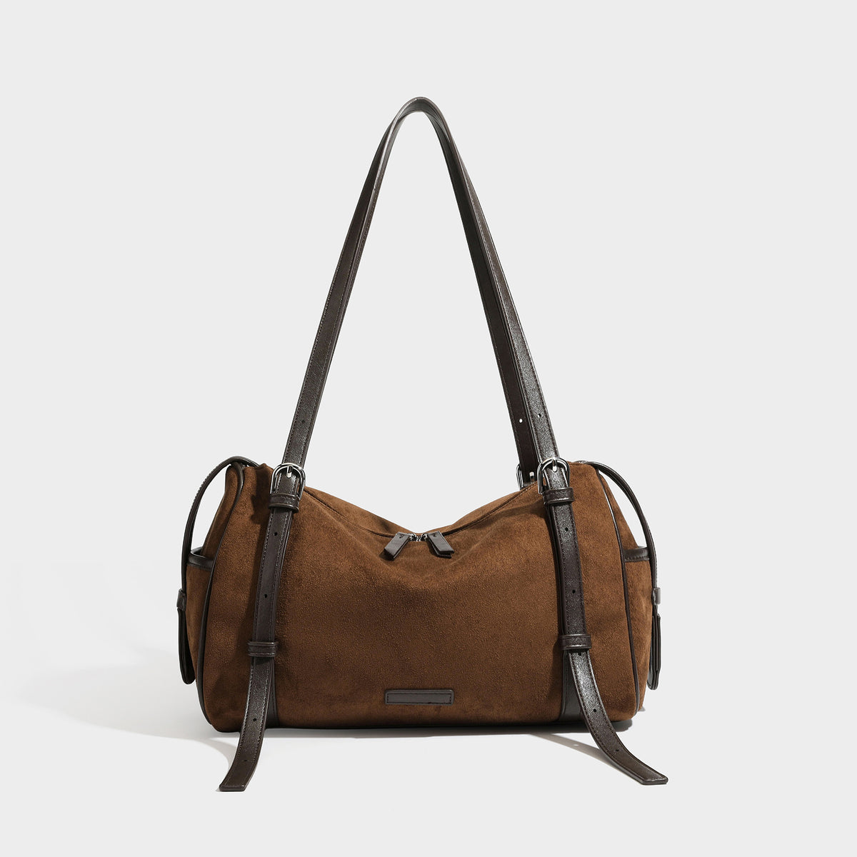 Large brown suede-finish barrel shoulder bag with dark leather-look trim, silver-tone zippers, dual top handles, and long