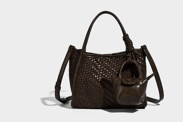 Woven texture open-top tote bag with smooth trim top handles and attached mini drawstring pouch in dark brown, detail view 14