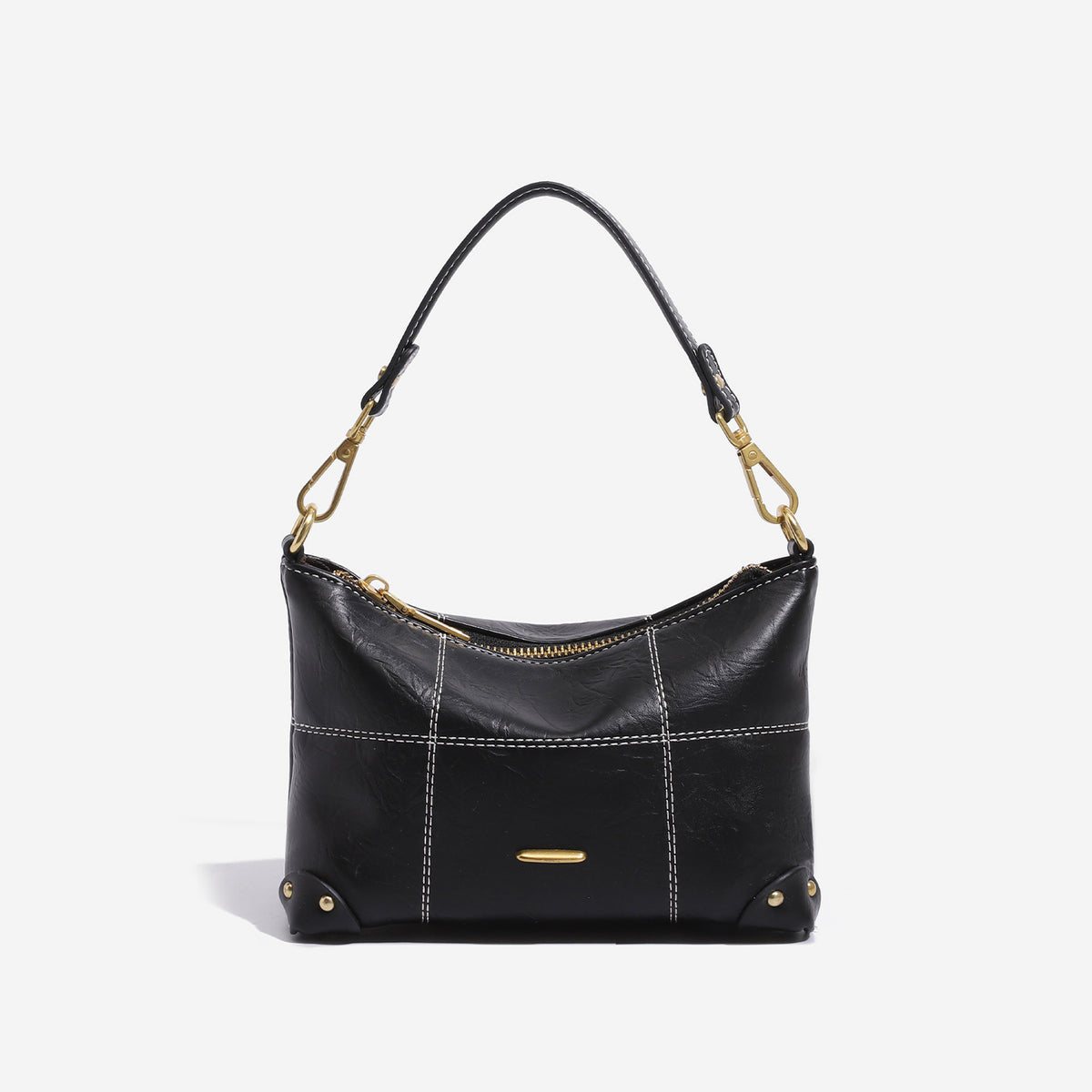 Small soft-structured shoulder bag with curved zip closure, stitched panel detailing, and gold-tone hardware, detail view 7