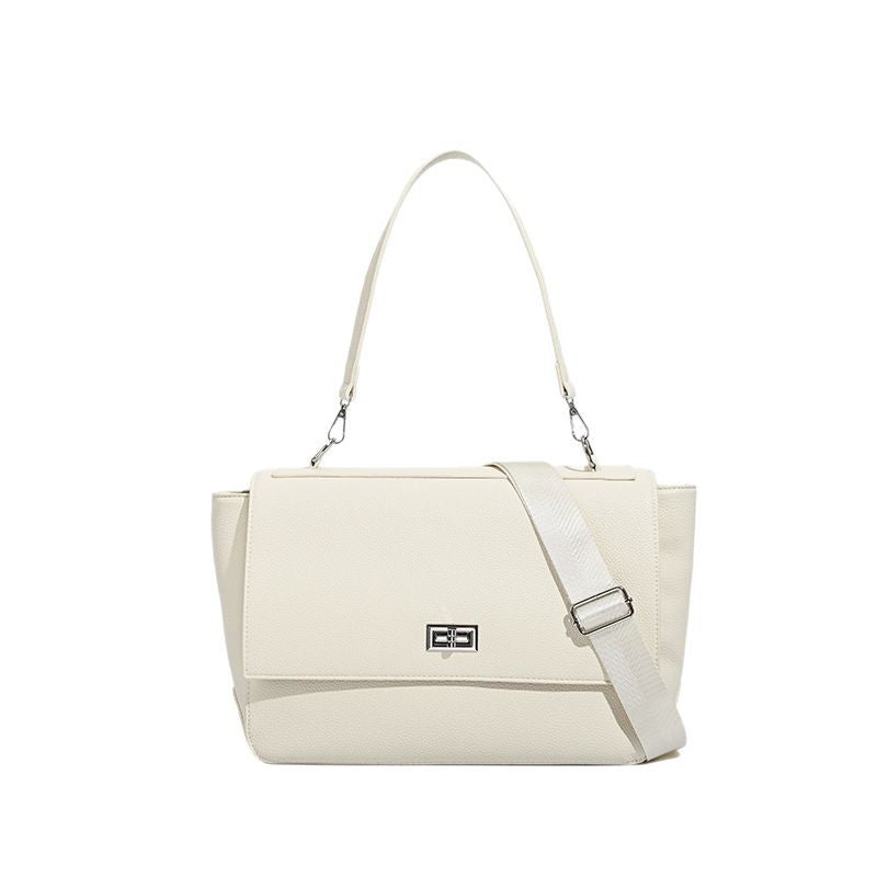 Large structured pebbled-finish flap shoulder bag with silver turn-lock closure and adjustable strap, detail view 5