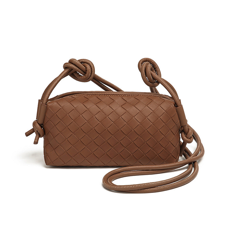 Small rectangular woven-texture mini crossbody bag with knotted rope strap and gold-tone zip closure, detail view 10