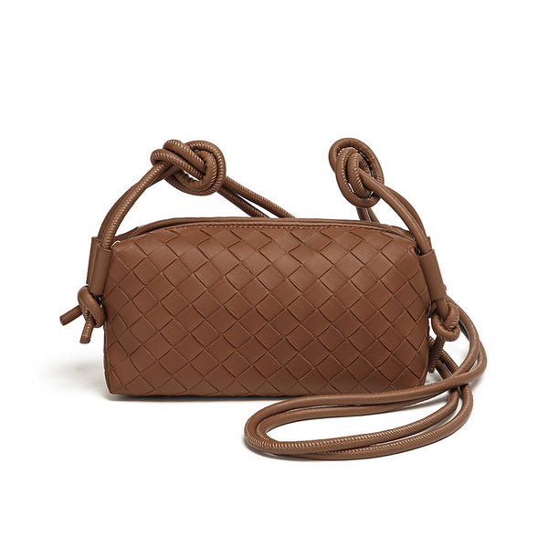 Small rectangular woven-texture mini crossbody bag with knotted rope strap and gold-tone zip closure, detail view 10