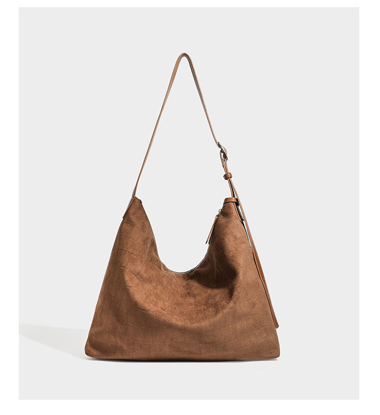 Slouchy croc-embossed matte hobo shoulder bag with adjustable strap and top zip closure, detail view 18