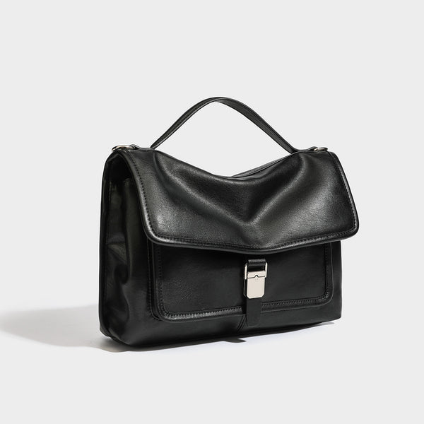 Structured rectangular flap satchel in espresso brown leather-look finish with silver-tone turn-lock buckle, top handle, and