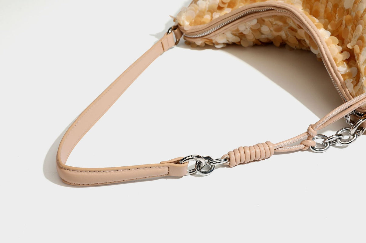 Slouchy paillette sequin hobo shoulder bag with zip closure and adjustable leather-look strap with silver chain hardware