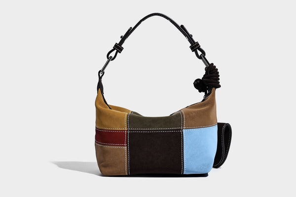 Kompakte Patchwork-Schultertasche mit geknotetem dunklem Henkel, mehrfarbigen Partien in Braun, Beige, Senfgelb, Oliv, Burgunderrot, Schwarz und