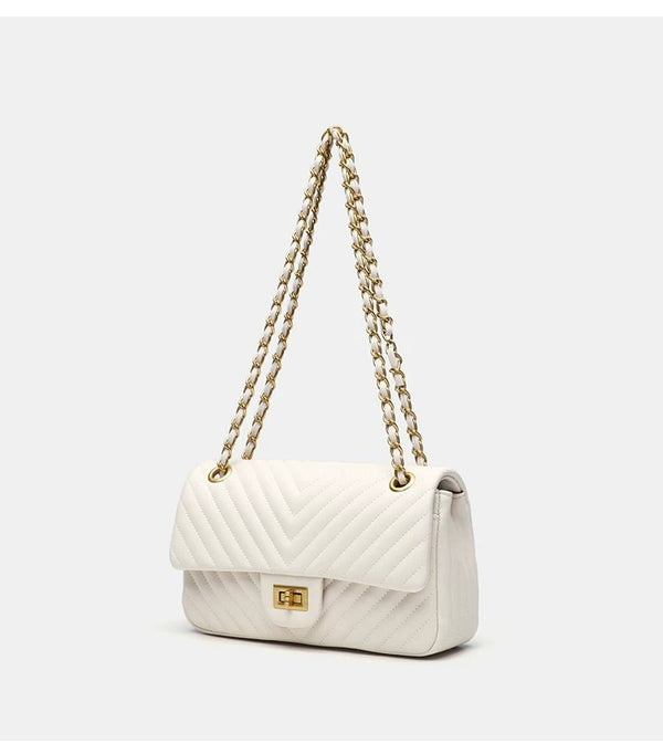 Structured quilted flap bag with gold-tone chain strap and turn-lock closure, detail view 14