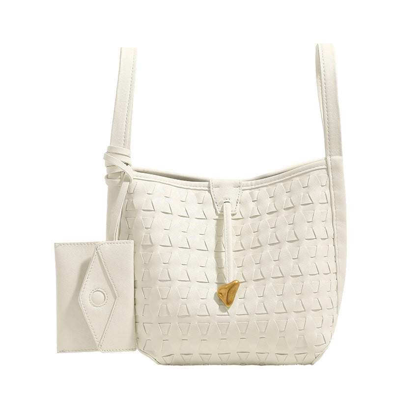 Woven embossed leather-look bucket bag with triangular texture pattern, gold-tone hardware, and attached mini snap pouch