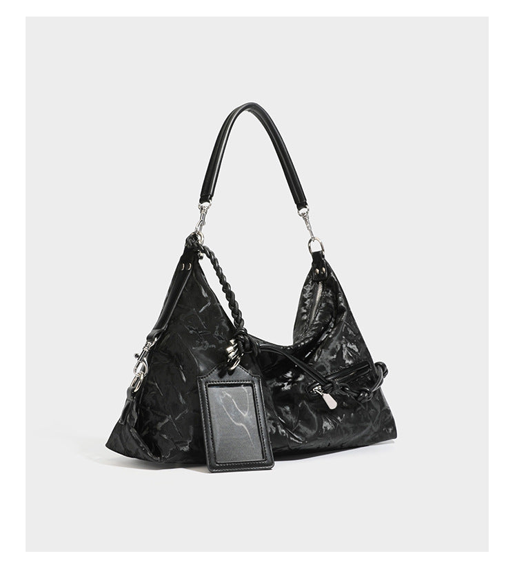 Slouchy hobo shoulder bag in crinkled metallic brown leather-look finish with braided rope knots, silver-tone hardware