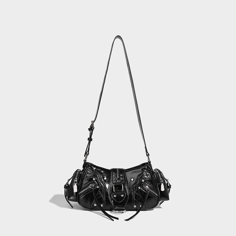 Compact glossy leather-look crossbody bag with silver studs, buckle hardware, and multiple zip pockets, detail view 26