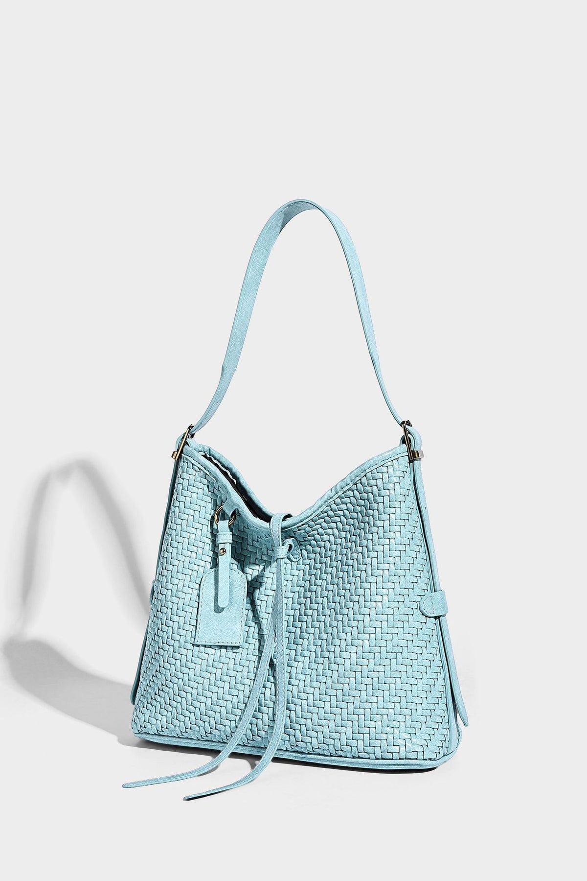Slouchy woven-texture bucket shoulder bag with tassel tie closure and gold-tone hardware, detail view 33