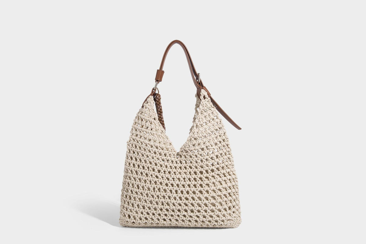 Slouchy open-knit crochet hobo tote bag with leather-look top handle and metal buckle hardware, detail view 18